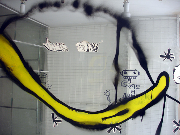 Painting on the window of empty commercial premises, Athens 2005