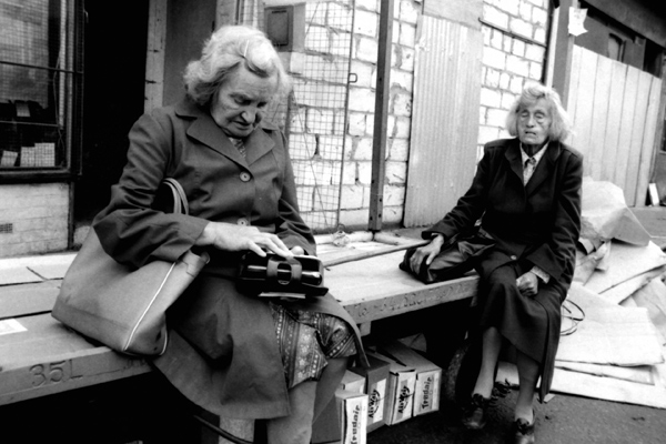 Woman looking into her purse, Cheshire Street 1989