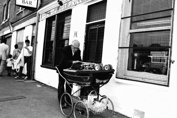 Man with a pram, Toynbee street 1988