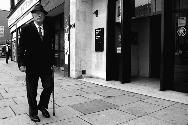 Man with a walking stick, Whitechapel Road 1984
