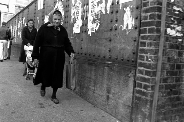 Lady walking on Brick Lane Bridge, 1985