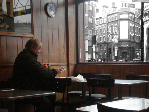 One Customer at Rossi's. Hanbury Street, London 2009.