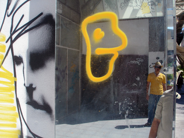 Street art on empty Greek shops in Athens 2005