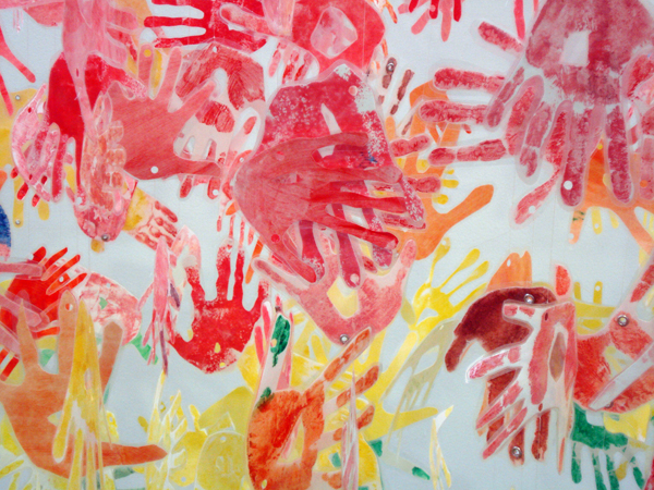 Hands at the lightbox gallery. Woking 2005