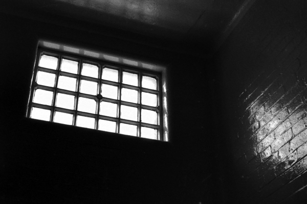 The cell window, Bethnal Green Police Station. London 1985 (Bishopsgate collection)