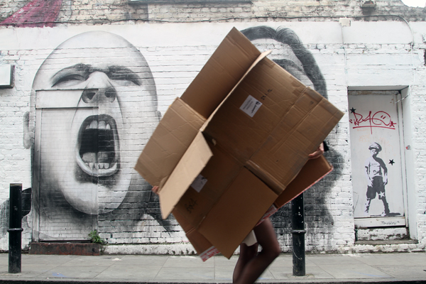 Moving and collapsed cardboard box. Spitalfields, London 2012