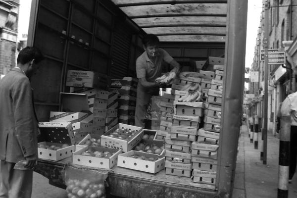 Vegetables sold from the back of a lorry. Brick Lane, London c.1984