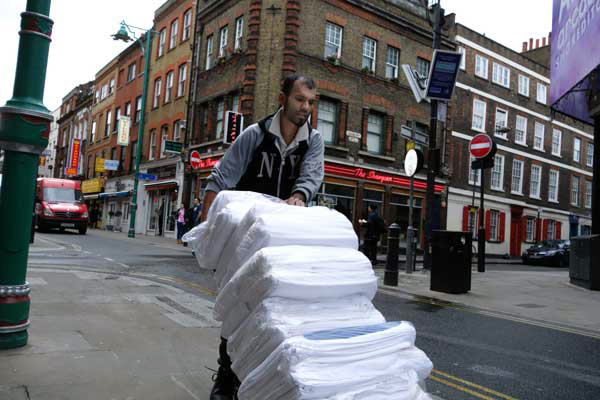Man with trolley, Brick Lane London 2012