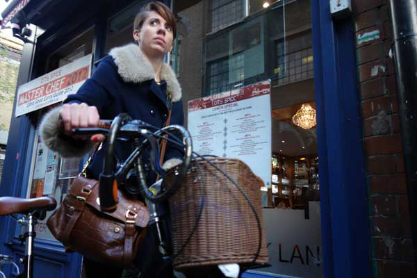 Woman with bike, Whitechapel London 2013