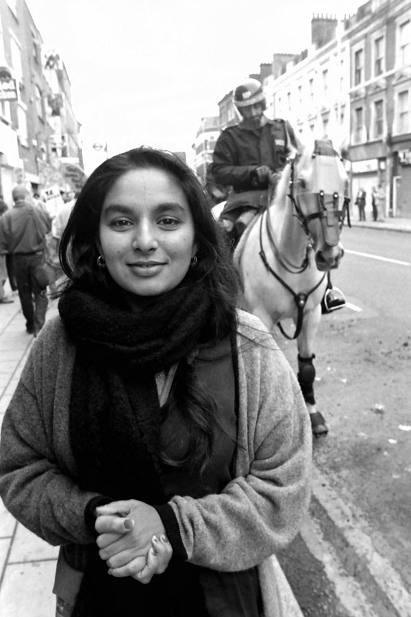 Julie Begum on Bethnal Green Road during anti BNP demo early 1990s