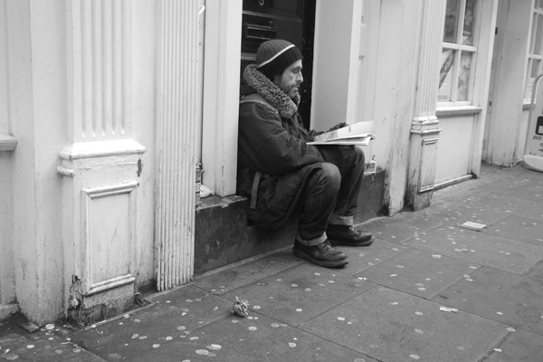Man reading. Brick Lane, London 2006.