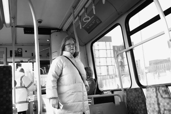 Woman. On the bus, Liverpool 2017.
