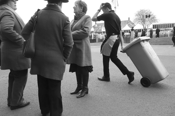 Removing empty bottles. Aintree 2017.