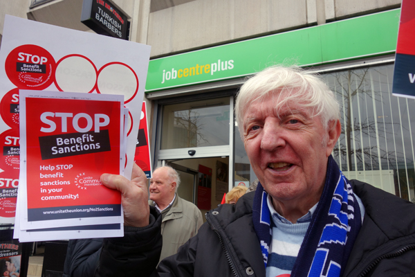 A member of the Merseyside Pensioners Association protesting outside the Job Centre. Liverpool 2017.