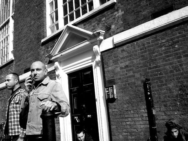 On the phone. Brick Lane, London 2009.