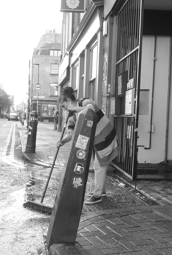 Washing the street. Hanbury street. East London 2017.