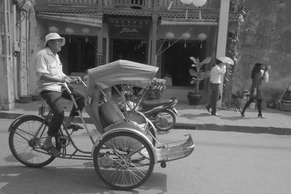 Rickshaw driver. Hoi An, Vietnam 2016.