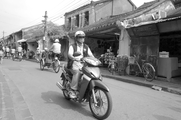 Motorcyclist. Hoi An, Vietnam 2016.
