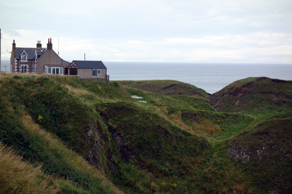 House at the top of a cliff. North East Scotland. August 2017. 