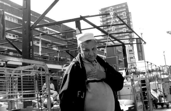 Market trader in Watney Market. East London, August 2008.
