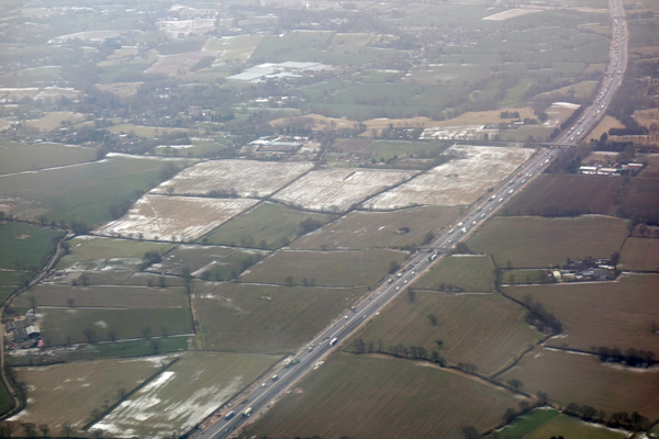 Descent into Manchester airport with a motorway view. March 2018.