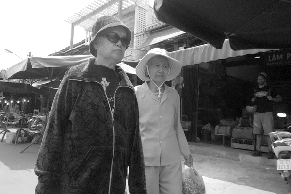Two women. Hoi An, Vietnam 2016.