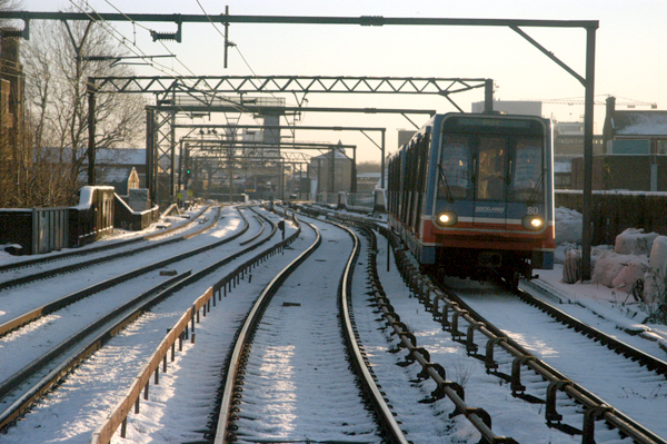 Snow on the tracks of the Docklands Light Railway. East London, January 2002.