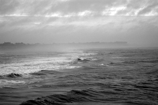 Stormy sea and clouds viewed from the pier. Southwold, December 2002.