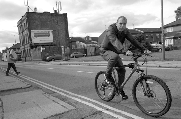 Cyclist on Wellington Road. Liverpool, September 2019.