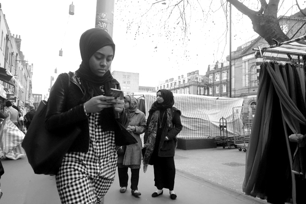 Looking at a mobile. Whitechapel 2016