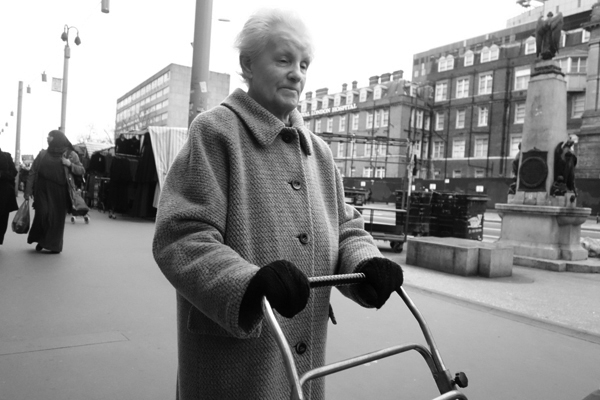 Woman with shopping trolley. Whitechapel 2016