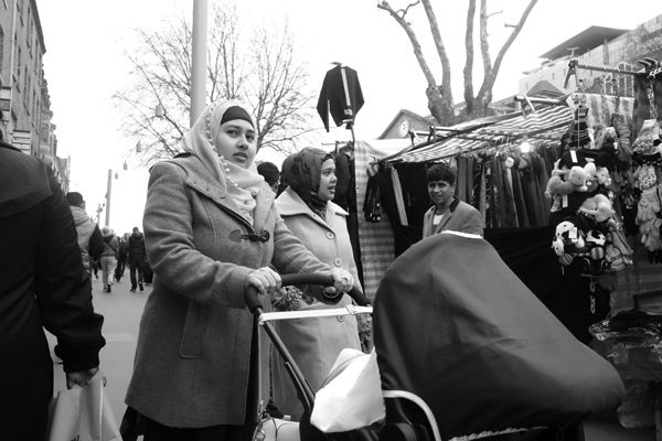 Woman with push chair. Whitechapel 2016